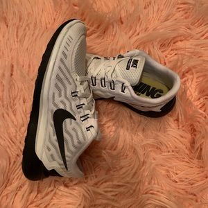 Black and white Nike Running Shoe